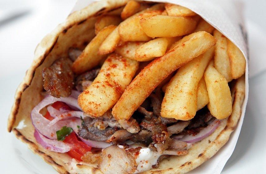 OPENING: They are celebrating and they are giving away free gyros in pita!